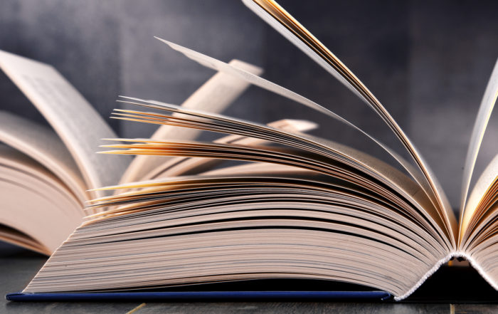 Composition with open book on the table