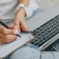 person studying with computer