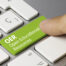 OER Open Educational Resources Written on Green Key of Metallic Keyboard. Finger pressing key.