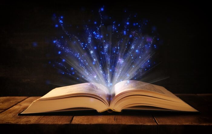 fantasy book open on table for summer reading!