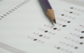 close up pencil bubbling answer sheets, test taking strategies
