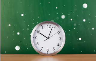 How to study for the ISEE during winter break cover—clock in front of a green chalkboard